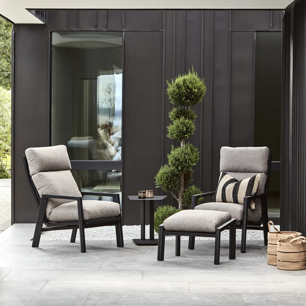 Slide-Sessel- und Fußhockergruppe