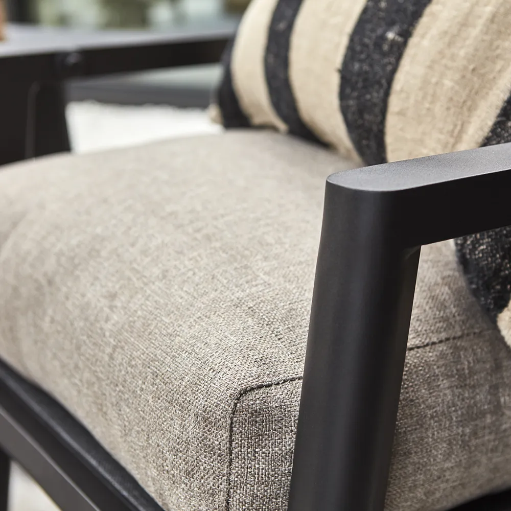 Slide-Sessel- und Fußhockergruppe